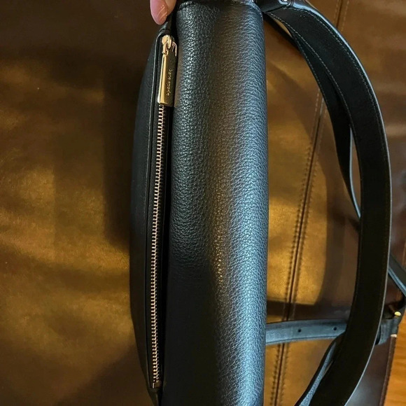 This is a NWT Kate Spade purse in black pebble leather with gold furnishings. - Picture 6 of 9